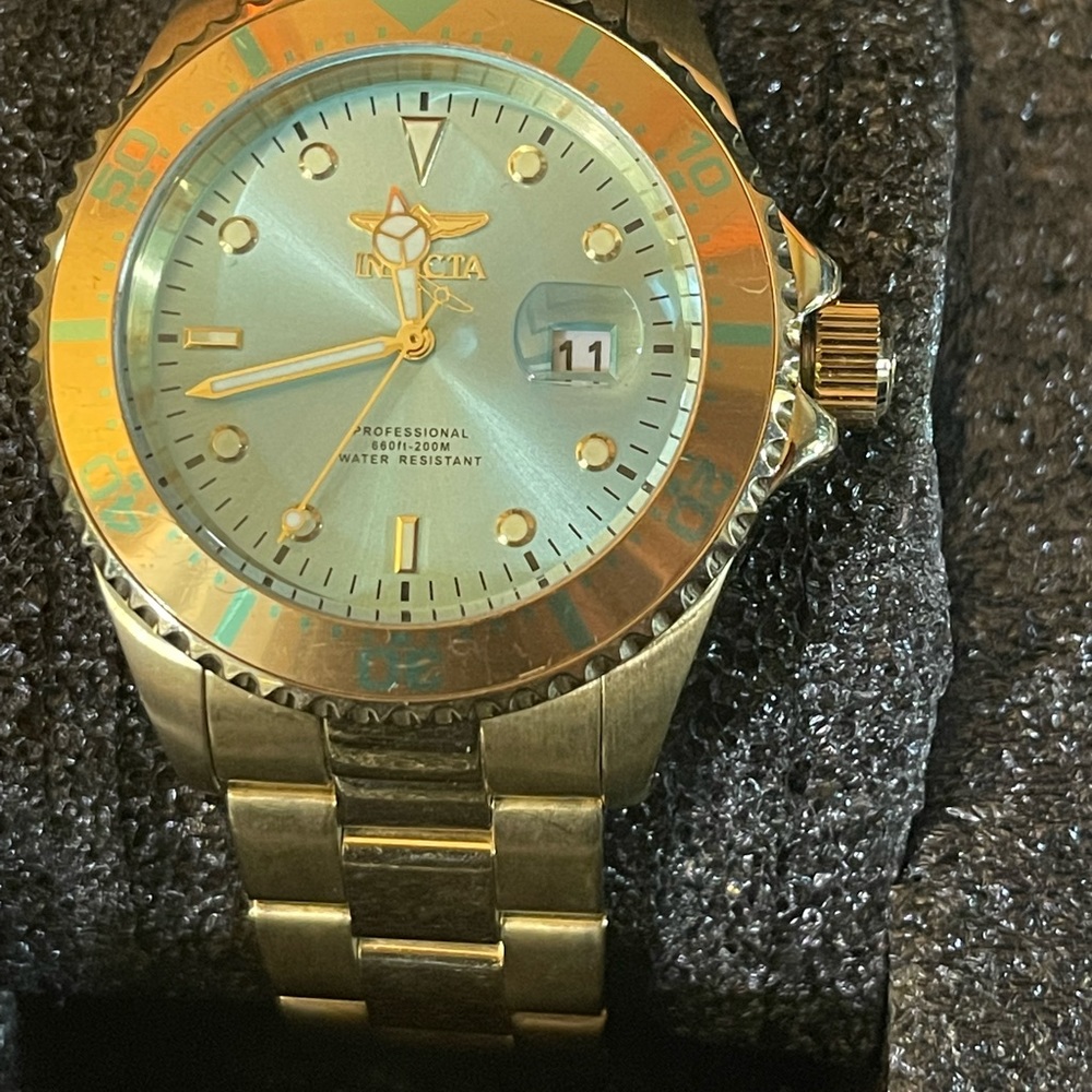 Sleek & classy invita watch for sale. Face is a Sea foam green color